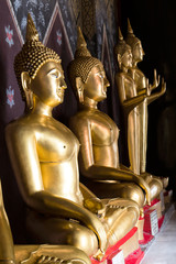 Buddha statue on a pedestal.