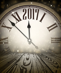 2017 New Year wooden background.