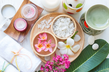 Beauty and fashion concept with spa set on white rustic wooden background
