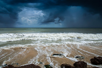 Rain cloud and Stormy sea.