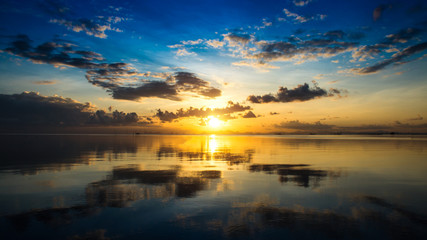 Fototapeta na wymiar Sunset sky and clouds over the lake, Thailand.