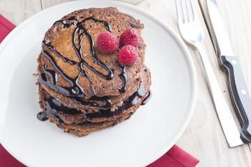 Pancakes with chocolate and berry