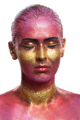 Glitter makeup on a beautiful woman face on a black background