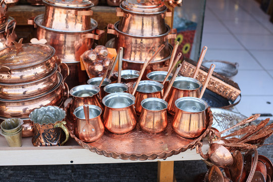 Traditional copper dishes in historical market (Bazaar) in Isfahan, Iran
