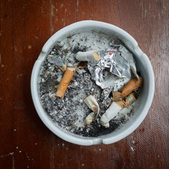 cigarette stub in ashtray, image no smoking concept background