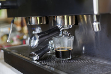 coffee making process from coffee machine in cafe shop