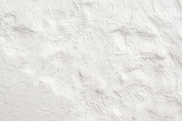 White wall with plaster pattern background. Textured backdrop, design repair, bas-relief. House repair concept