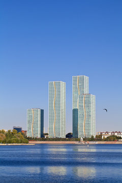 Kazakhstan, Astana, View of appartment buildings reflecting in Ishim River