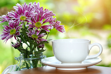 White cup coffee in the morning time.