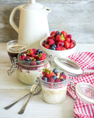 Overnight oats (Bircher muesli) with berries for healthy beautiful breakfast