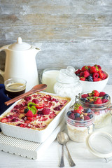 Healthy paleo oatmeal porridge baked with berries and overnight oats (Bircher muesli) for breakfast