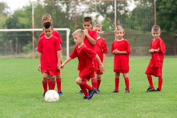  Boys kicking ball