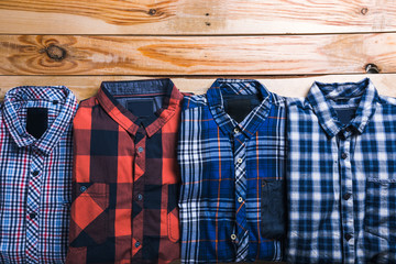shirts plaid in plan with wooden background