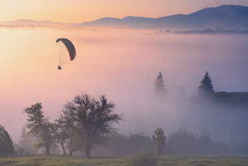 Above the milky valley