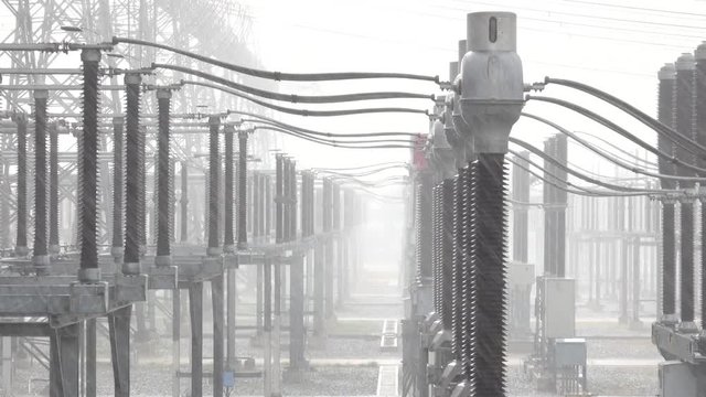 Slow Motion Electricity substation in the rain