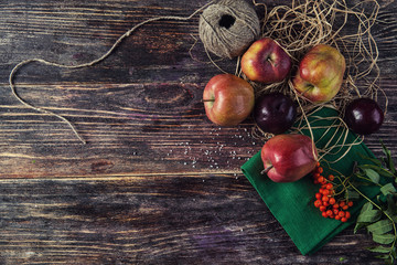 Fototapeta na wymiar Healthy Organic fruits on a Wooden Background. Art Border Design