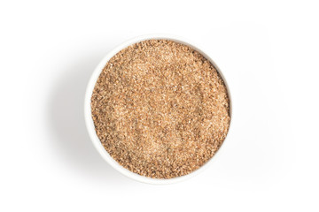 Ground Wheat into a spoon. Trigo para quibe. Kibbeh