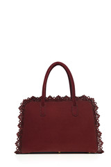 Leather female handbag isolated on white