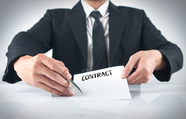 A man giving  a contract