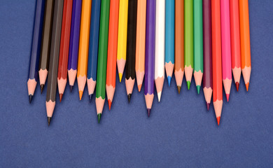 Set of Colorful pencils isolated on blue background