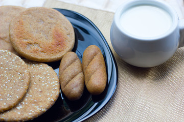Beautiful homemade bread on black plate