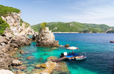 Fototapeta na wymiar rocky beach in Paleokastritsa on Corfu island, Greece