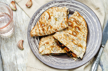 Black beans spiced sweet potato quesadilla