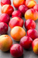 Fototapeta na wymiar Fresh fruit on the gray background.