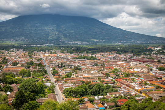 City view of Antigua Guatemala from Cerro de La Cruz with Agua Volcano in the background
