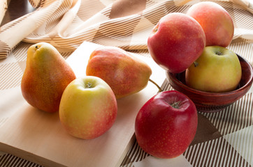 Autumn apples and pears illuminated backlit