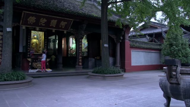 Pan to a temple and Buddha Wenshu Monastery (Manjushri Monastery)