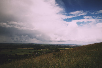 Fototapeta na wymiar Cloudy view over the Chilterns in Buckinghamshire Vintage Retro