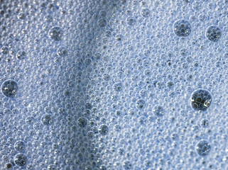 Foam on the glass. Image has tonal exchange to create different color.