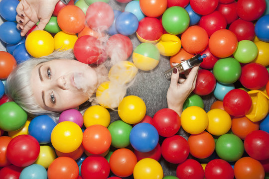 Young woman in a ball pit