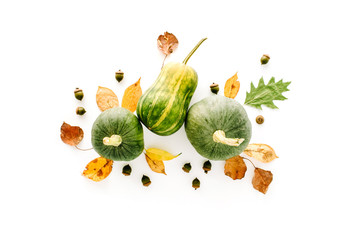 autumn fall flat lay, top view arrangement. pumpkin, leaves on white background, flat lay, top view