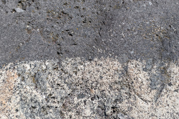 The surface of the stone.