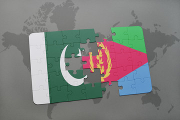 puzzle with the national flag of pakistan and eritrea on a world map background.