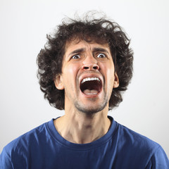 Furious young man portrait.