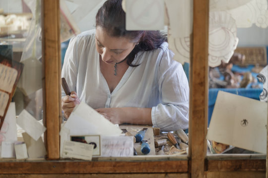 Bulgarian artisan focused on whittling traditional woodwork