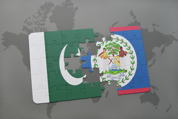 puzzle with the national flag of pakistan and belize on a world map background.