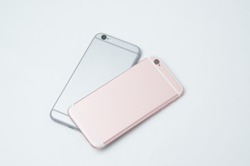 pink and gray smart phone