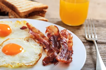 Foto auf Acrylglas Spiegeleier Fried eggs and bacon