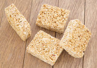 Amaranth bars in the wooden background
