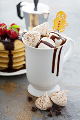 Hot chocolate with marshmallows and little meringues