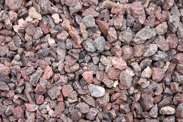 Closeup of crushed gravel stone background or texture. Top view.