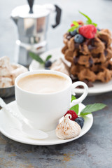 Obraz na płótnie Canvas Cup of coffee for breakfast with waffles