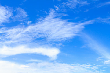 Fototapeta premium Blue sky background with white clouds. The vast blue sky and clouds sky on sunny day. White fluffy clouds in the blue sky.