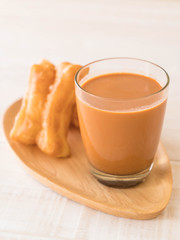 deep-fried dough stick with milk tea