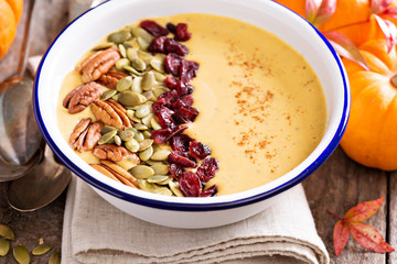 Pumpkin smoothie bowl with nuts and seeds