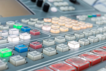 switcher vision mixing panel in a television gallery.